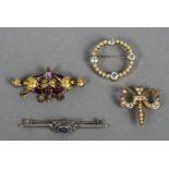 Three various Victorian/Edwardian gold brooches and a silver brooch Various sizes.