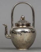 A Japanese silver teapot Of small proportions,