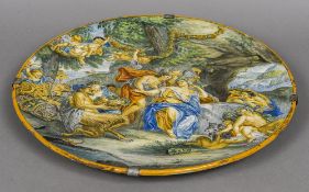 An antique Cantagalli charger Decorated with cherubs and Bacchanalic figures,