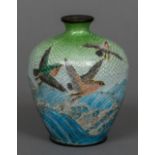 A small cloisonne vase Decorated with birds above cresting waves. 9.5 cm high.
