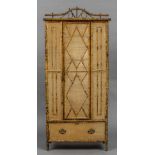 A Victorian bamboo wardrobe Of typical form,