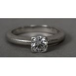 A diamond set platinum solitaire ring The stone approximately 0.45 carats.