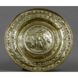 A 17th/18th century brass charger Of typical dished form,