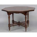 A late Victorian Aesthetic walnut centre table Of octagonal form,