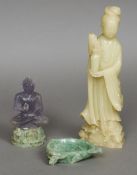 A large Chinese carved jade figure of Guanyin Typically modelled;