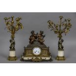 A 19th century patinated bronze mounted white marble clock garniture The white enamelled dial with