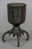 A Chinese patinated bronze vase With Greek key and lappet decorations above the three elephant mask