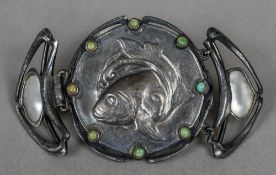 An Art Nouveau buckle Mounted with mother-of-pearl and turquoise cabochons centred with a fish.