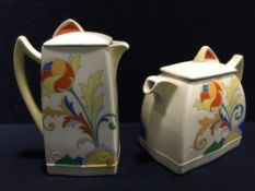 A Royal Doulton pottery teapot Decorated in the Cresta pattern, printed mark to base,