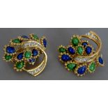 A pair of Kutchinsky 18 ct gold ear clips Each set with a band of diamonds and with blue and green