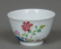 A Chinese famille rose porcelain wine cup Decorated with floral sprays and insects,