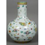 A Chinese porcelain baluster vase Decorated with floral sprays interspersed with butterflies,