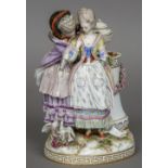 A 19th century Meissen porcelain group "The Secret" after Acier & Schonheit Blue painted crossed