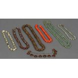 A quantity of various Chinese bead necklaces Various materials and sizes.