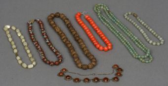 A quantity of various Chinese bead necklaces Various materials and sizes.