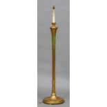 An early 20th century gilt painted standard lamp Of reeded fluted form. 154 cm high.