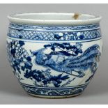 A Chinese blue and white porcelain jardiniere Decorated with a pair of phoenixes interspersed with