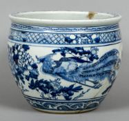 A Chinese blue and white porcelain jardiniere Decorated with a pair of phoenixes interspersed with