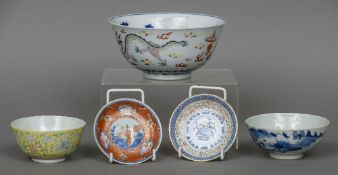 A Chinese porcelain bowl The exterior decorated with five clawed dragons chasing flaming pearls,