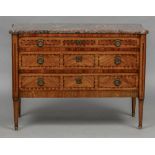 A Louis XVI style marble topped commode The shaped rectangular variegated marble top above an