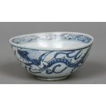 A Chinese blue and white porcelain bowl Decorated with dragons chasing flaming pearls.