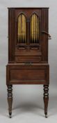 A 19th century barrel organ The hinged rectangular top above the gilt decorated typed front,