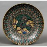 A 19th century Japanese charger Decorated in the famille verte palette centred with a dragon.