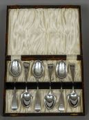 A set of six silver dessert spoons, hallmarked London 1843,