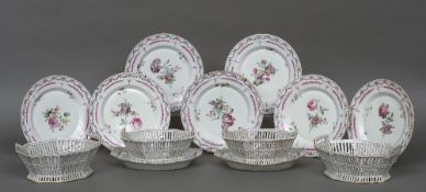 A quantity of 19th century Berlin porcelain dessert plates and baskets Each decorated in the