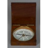 A George III mahogany cased compass The hinged cover enclosing a glazed 3.