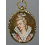 A portrait miniature of a young lady in historical costume Glazed and gilt white metal framed with