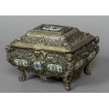 A 19th century Continental enamel mounted silvered bronzed casket Of domed hinge form,