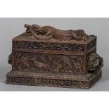 A late 19th century Anglo-Indian carved hardwood box The hinged rectangular lid decorated with a