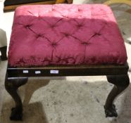 An upholstered stool