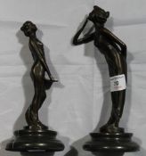 A pair of Art Nouveau style bronze girls