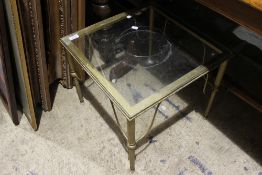 A glass top side table