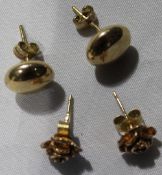 Two pairs of 9 ct gold ear studs