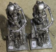 Two silvered models of skeletons