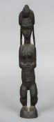 An African tribal carved figure, probably Uruba Tribe,
