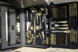 A gold plated canteen of cutlery