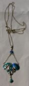 A Charles Horner silver and enamel pendant on a silver chain,