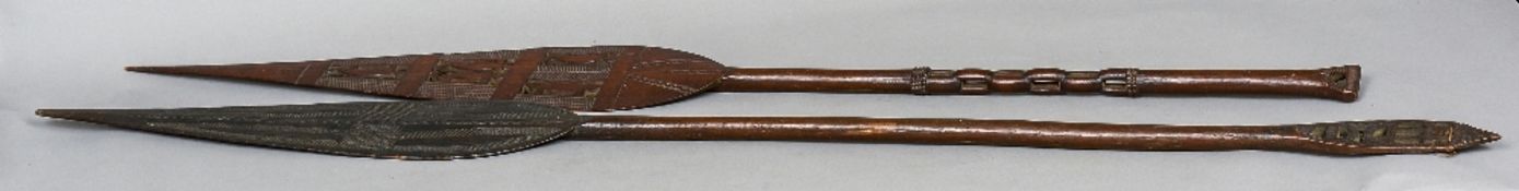 Two early 20th century African tribal ceremonial paddle spears CONDITION REPORTS: