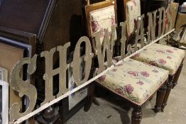 A cast iron Showlands sign