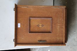 An early 20th century oak wall hanging cupboard