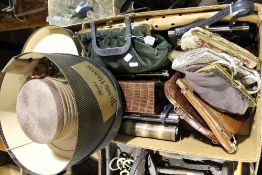 A collection of vintage handbags and hats