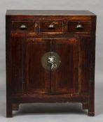 A Chinese stained elm cabinet CONDITION REPORTS: Some scuffing, scratching,