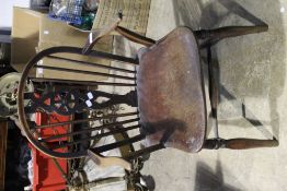 A wheel back Windsor armchair