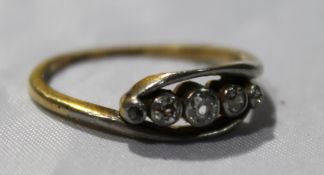 An 18 ct gold diamond set five stone ring