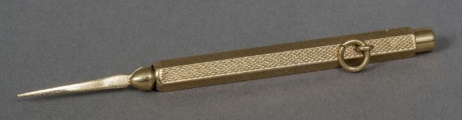 A 9 ct gold toothpick CONDITION REPORTS: Generally in good condition, expected wear,