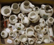 A collection of Goss crested ware